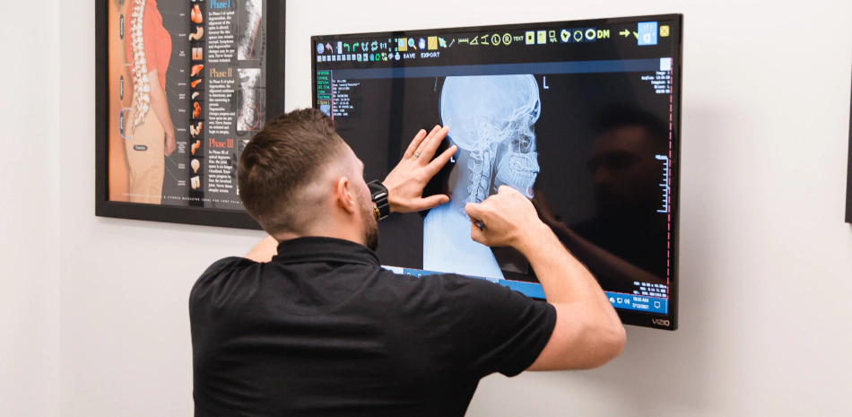 doctor examining a client's x rays doctor examining a client's x rays